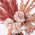 Close-up of vase silhouette detail on this Autumn Burst - Mauve Pampas Faux Floral Arrangement