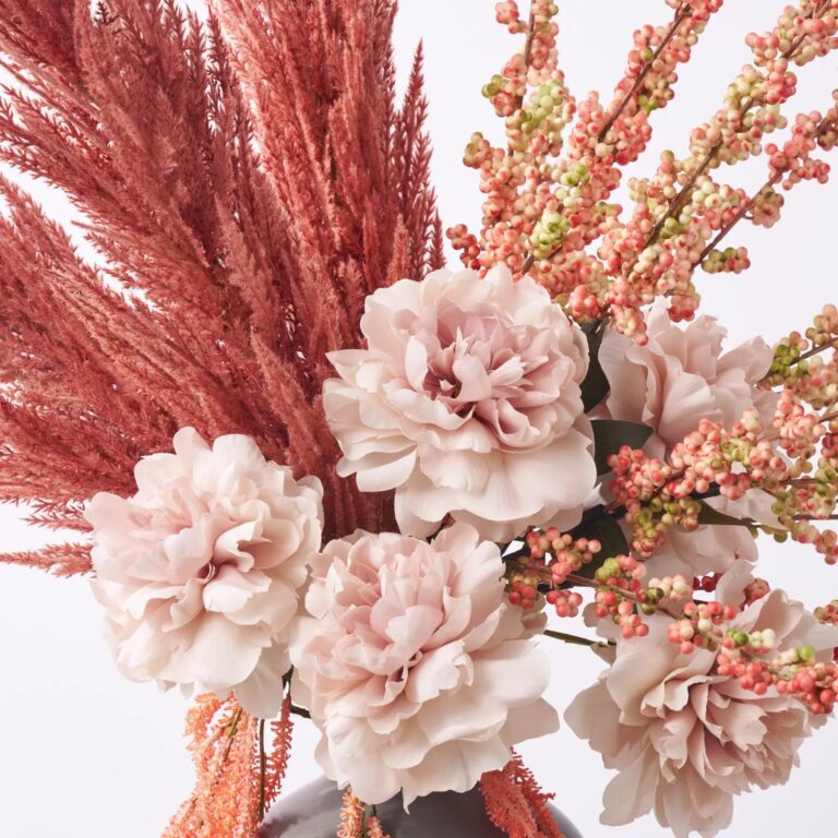Close-up of vase silhouette detail on this Autumn Burst - Mauve Pampas Faux Floral Arrangement
