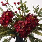 Close-up of bloom cluster detail on this Tuscan Christmas - Deep Red Floral Centerpiece Arrangement