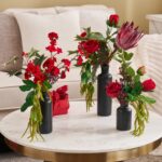 Alternate angle of the Royal Crimson Triptych Bottle Set Valentine's Day Arrangement showing full arrangement