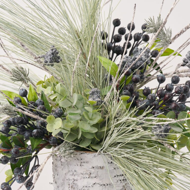 Close-up of leaf foliage texture on this Frosted Berry Blues - Sage Christmas Holiday Arrangement