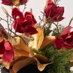 Alternate angle of the Gilded Christmas Magnolia - Golden Vase Holiday Arrangement showing bloom arrangement