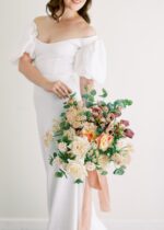 Side view of the Beige Real Touch Duchess Rose Fake Flower - revealing bloom tips
