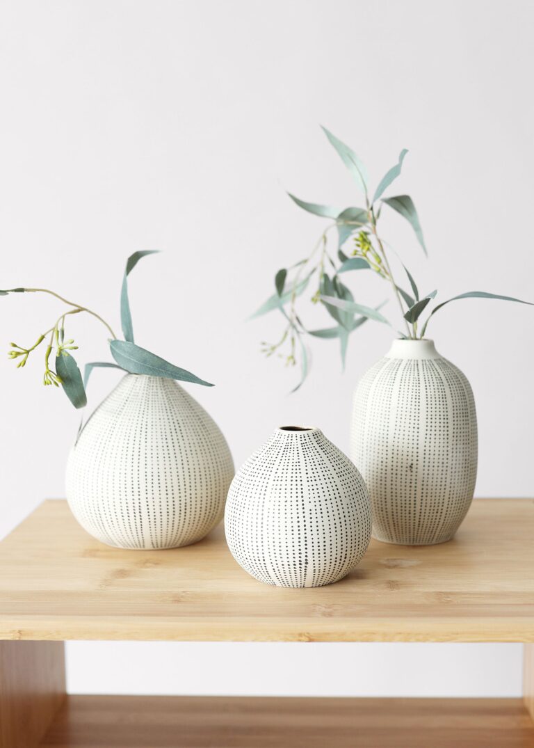 Close-up of vase silhouette detail on this Set of 3 Dotted Stoneware Stoneware Bud Vases