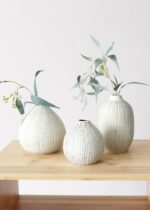 Close-up of vase silhouette detail on this Set of 3 Dotted Stoneware Stoneware Bud Vases