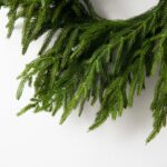 Close-up detail capturing ribbon and accent detail of the Norfolk Collection - Real Touch Holiday