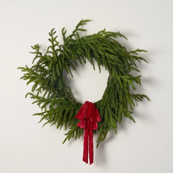 Close-up of blooms and berries on this Norfolk Collection - Real Touch Holiday Winter Wreath