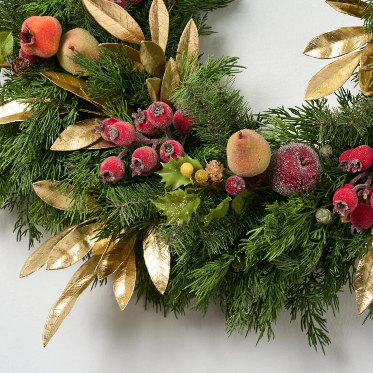 Close-up of blooms and berries on this Della Robbia Style Christmas Holiday Christmas Holiday Wreath