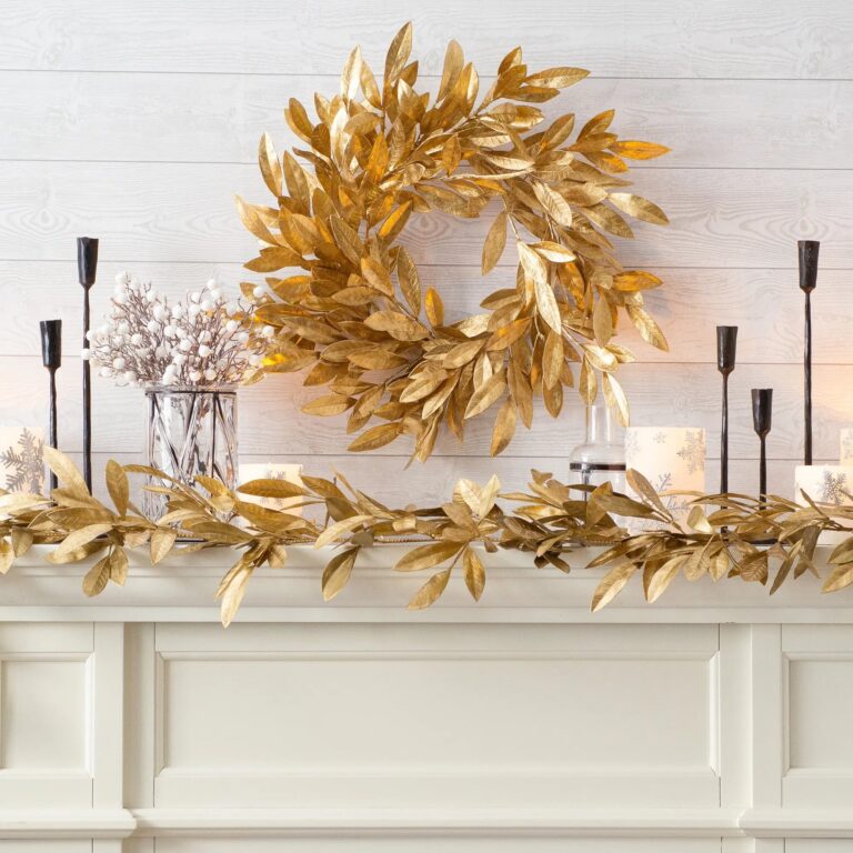 Close-up of blooms and berries on this Antiqued Gold Bay Leaf Christmas Front Door Wreath