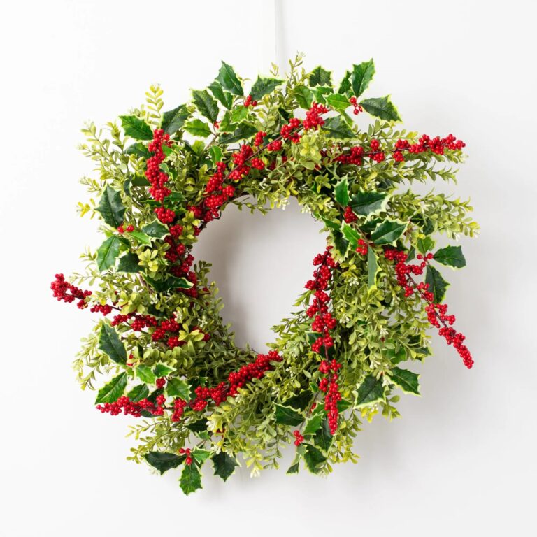 Close-up of blooms and berries on this Holly and Red Winterberry Boxwood Front Door Wreath