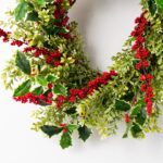 Alternate angle of the Holly and Red Winterberry Boxwood Front Door Wreath showing wreath face