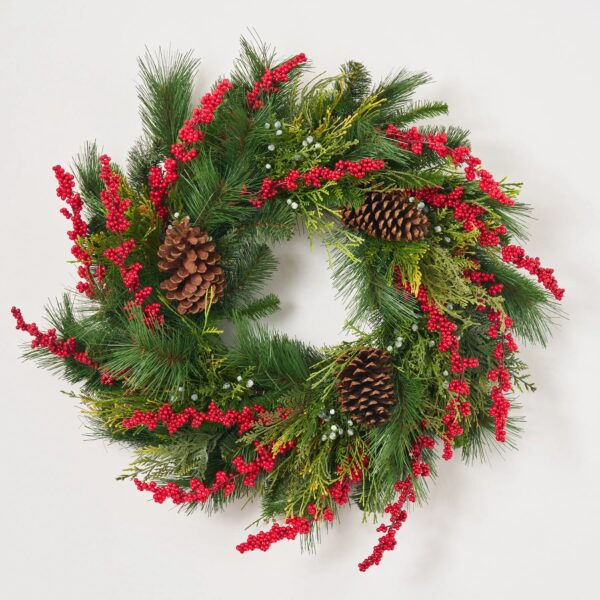 Close-up of blooms and berries on this Classic Mixed Pine, Cedar, Red Front Door Wreath