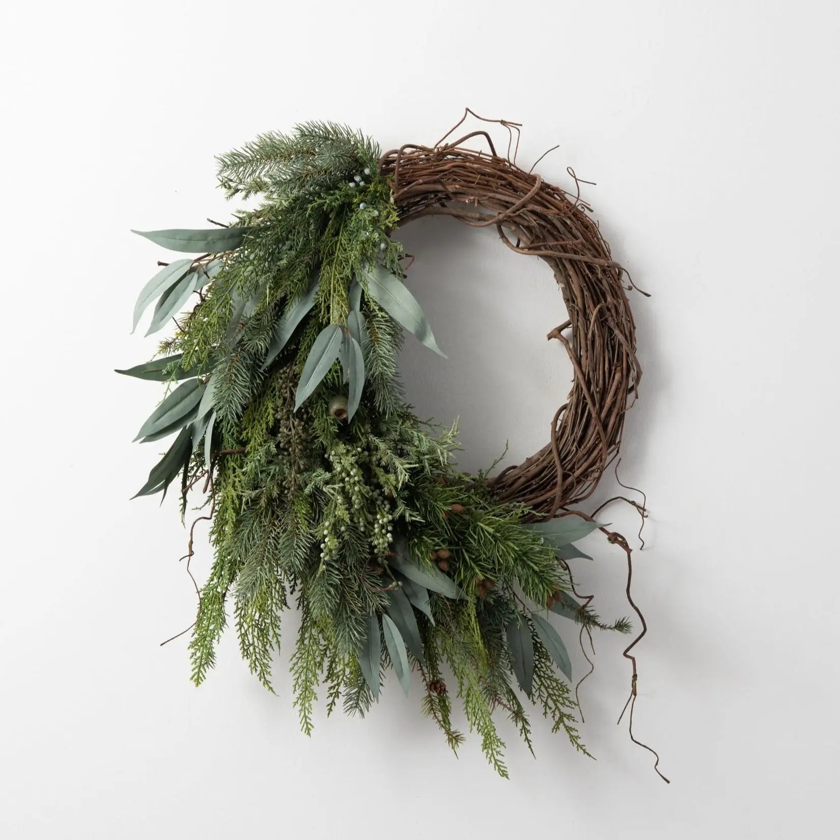 CW1265Winter_sBounty-MixedJuniper_Eucalyptus_WinterPineHolidayAsymmetricalFrontDoorWreath_3.jpg Winter's Bounty - Mixed Juniper, Eucalyptus and Winter Pine Holiday Asymmetrical Front Door Wreath
