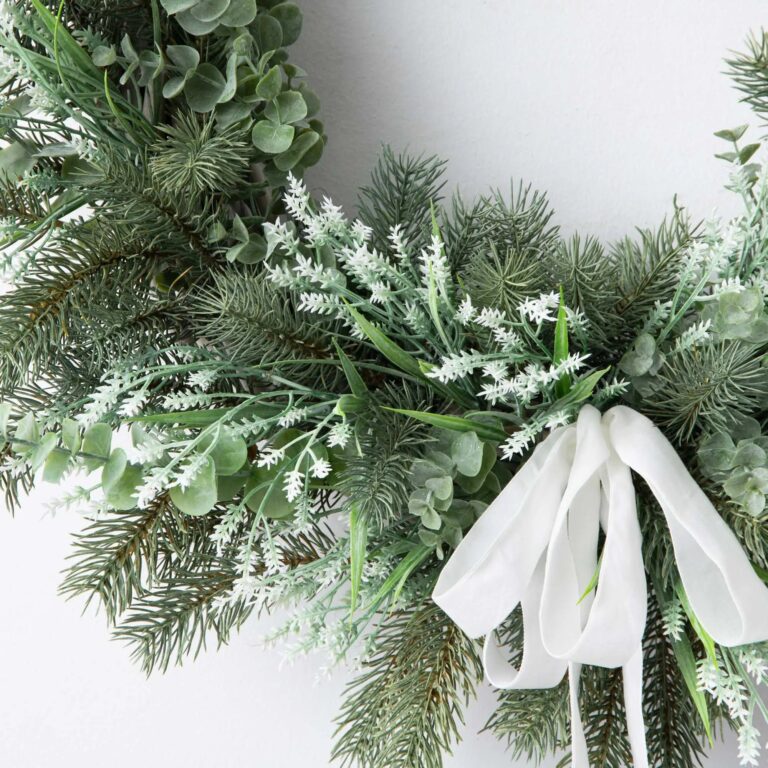 Close-up of blooms and berries on this White Lavender, Eucalyptus and Pine Bow