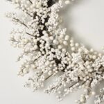 Alternate angle of the Waterproof Winter White Pearl Berry Front Door Wreath showing wreath face