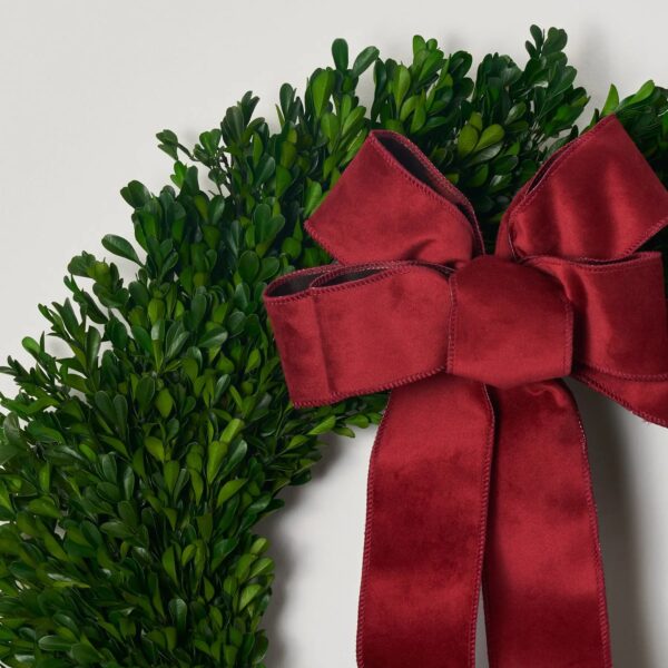 Close-up of blooms and berries on this Natural Preserved Green Boxwood Holiday Wreath Ribbon Bow