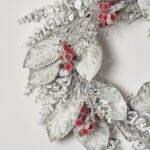 Close-up of blooms and berries on this Snow Covered Magnolia Leaf Holiday Winter Wreath