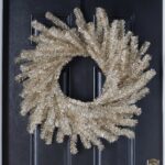 Close-up of blooms and berries on this Silver and Gold Metallic Soft Touch Tinsel Wreath