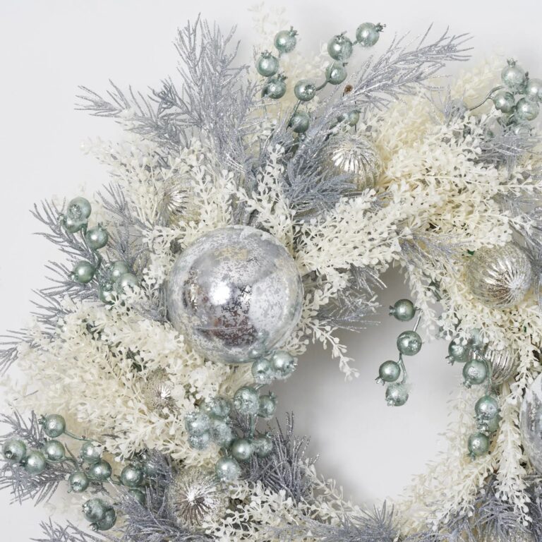 Close-up of blooms and berries on this Silver Glitter Pine and Shimmer Front Door Wreath