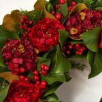 The Holiday Affair - Real Touch Door Christmas Wreath shown in full, highlighting full wreath