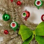 Close-up of blooms and berries on this Merry Grinchmas - Silver Tinsel, Front Door Wreath