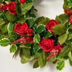 Close-up of blooms and berries on this Holly Jolly Christmas - Red Front Door Wreath