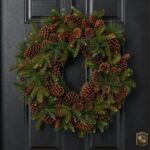 Alternate angle of the Classic Mixed Pine with Pinecones Door Christmas Wreath showing wreath face