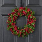 Alternate angle of the Lifelike Green Boxwood and Mixed Front Door Wreath showing wreath face