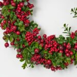 Close-up of blooms and berries on this Lifelike Green Boxwood and Mixed Front Door Wreath