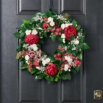 Alternate angle of the Christmas Frost - Red Peony, Front Door Wreath showing wreath face