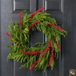 Detail view of layered greenery detail from the Berry Christmas to All Front Door Wreath