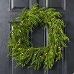 Detail view of layered greenery detail from the Twinkling Norfolk - White Pre Christmas Holiday