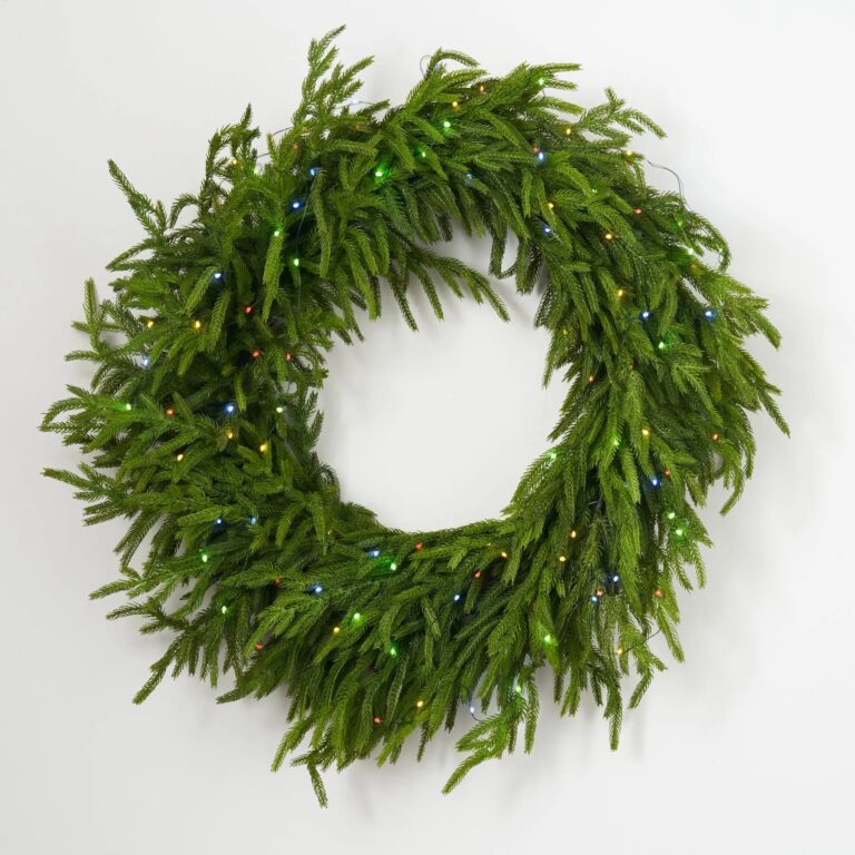 Close-up of blooms and berries on this Twinkling Norfolk - Dual Pre Christmas Holiday Wreath