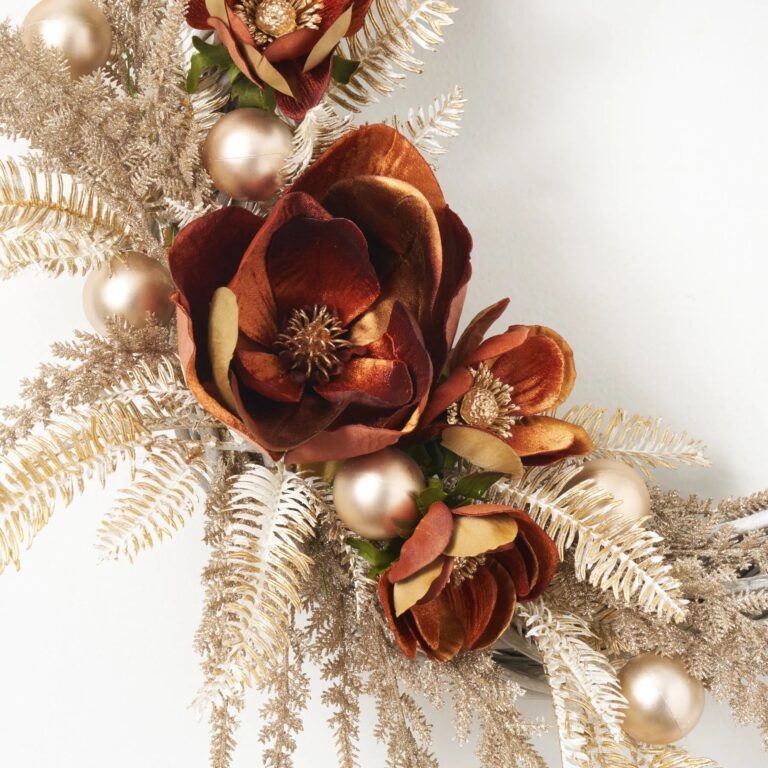 Close-up of blooms and berries on this Bronzed Copper Poppy and Magnolia Velvet Ribbon