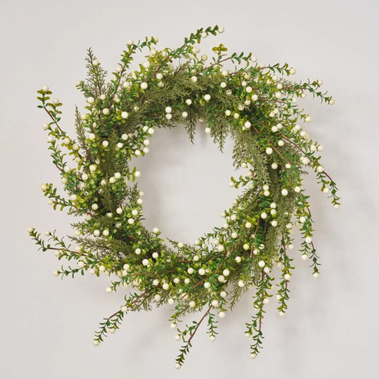 Close-up of blooms and berries on this Cream White Berry and Boxwood Front Door Wreath