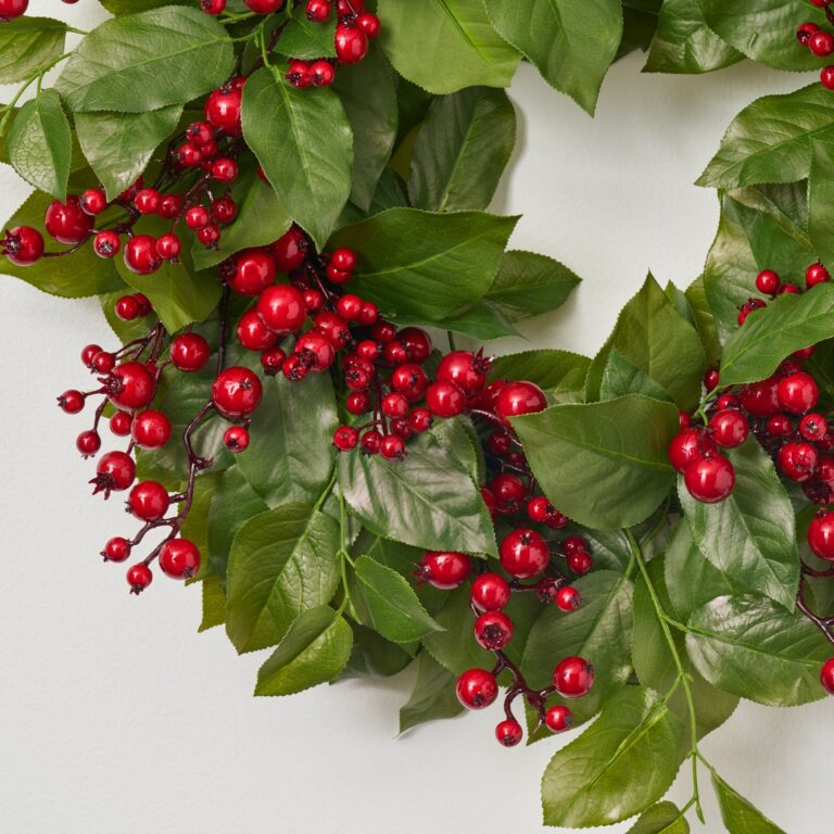 Close-up of blooms and berries on this Real Touch Salal Leaf Front Door Wreath