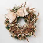 Alternate angle of the Gold Glitz and Champagne Ritz Estate Christmas Wreath showing wreath face
