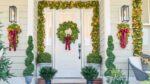 The Real Touch Magnolia Leaf Front Door Wreath shown in full, highlighting full wreath shape