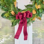 Close-up of blooms and berries on this Burgundy Red Garnet Taffeta Wire Drape Loop Bow