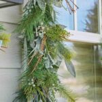 Side view of the Seeded Eucalyptus and Christmas Pine Holiday Mantle Garland revealing tip-to-tip full