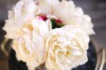 Close-up detail capturing glass texture detail of the Cream Real Touch Peony Floral Clear Glass