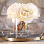 Side view of the Cream Real Touch Peony Floral Clear Glass Vase revealing bloom arrangement