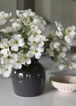 Alternate angle of the Large White Dogwood Branch and Slate Vase Design showing bloom arrangement