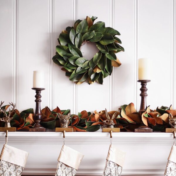 Close-up of blooms and berries on this Real Touch Magnolia Leaf Mini Candle Wreath Centerpiece