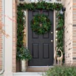 Detail view of berry and foliage detail from the Classic Holiday Greens and Pinecone Front