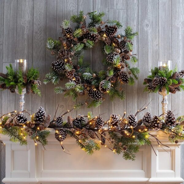 Close-up of blooms and berries on this Snowy Norway Spruce and Pinecone Front Door Wreath