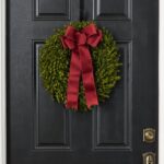 Side view of the Lifelike English Boxwood Leaf Christmas 5 Holiday Bow revealing frame and