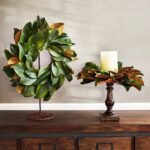 Side view of the Real Touch Magnolia Leaf Mini Candle Wreath Centerpiece revealing frame and