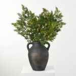 Alternate angle of the Real Touch Green Cedar and Pinecone Christmas Faux showing leaves along