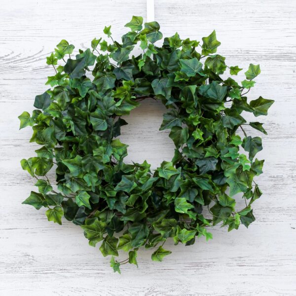Close-up of blooms and berries on this Dark Green Real Touch English Front Door Wreath